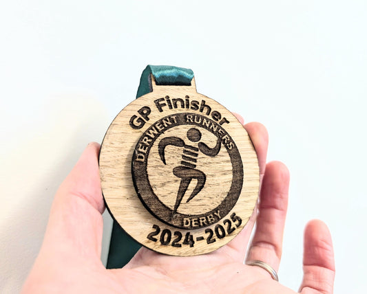 Personalised wooden double layer medals with or without ribbon. Custom wooden medals that include any wording and logo. Alternative medals