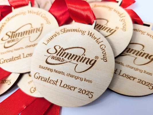 Personalised wooden medals with or without ribbon. Custom wooden medals that can include any wording and logo.
